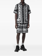Image of Medusa Chains Silk Shorts by Versace for Men - Season Spring-Summer 2025 - Model view 1