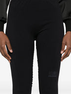 Bilde av MM6 x Salomon svarte leggings fra Mm6 for kvinner - Sesong Høst-Vinter 2024 - Detalj 7