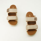 Image of Miu Miu Beige Canvas Mules by Miu Miu for Women - Season Spring-Summer 2026 - Top View Pair