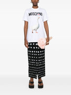 Image of White Goose Print T-Shirt by Moschino for Women - Season Spring-Summer 2025 - Model view 1