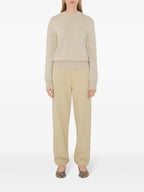 Imagem de Calças de Jogging Beige Cavalier da Burberry para Mulheres - Temporada Primavera-Verão 2025 - Vista do Modelo 1
