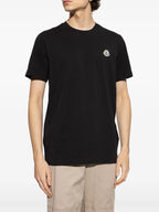 Image of Moncler Black T-Shirt Set by Moncler for Men - Season Spring-Summer 2026 - Model view 2