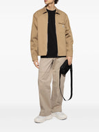 Image of Moncler Black T-Shirt Set by Moncler for Men - Season Spring-Summer 2026 - Model view 1