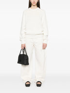 Image du pull en cachemire blanc Mae de Khaite pour femmes - Saison Automne-Hiver 2025 - Vue modèle 1