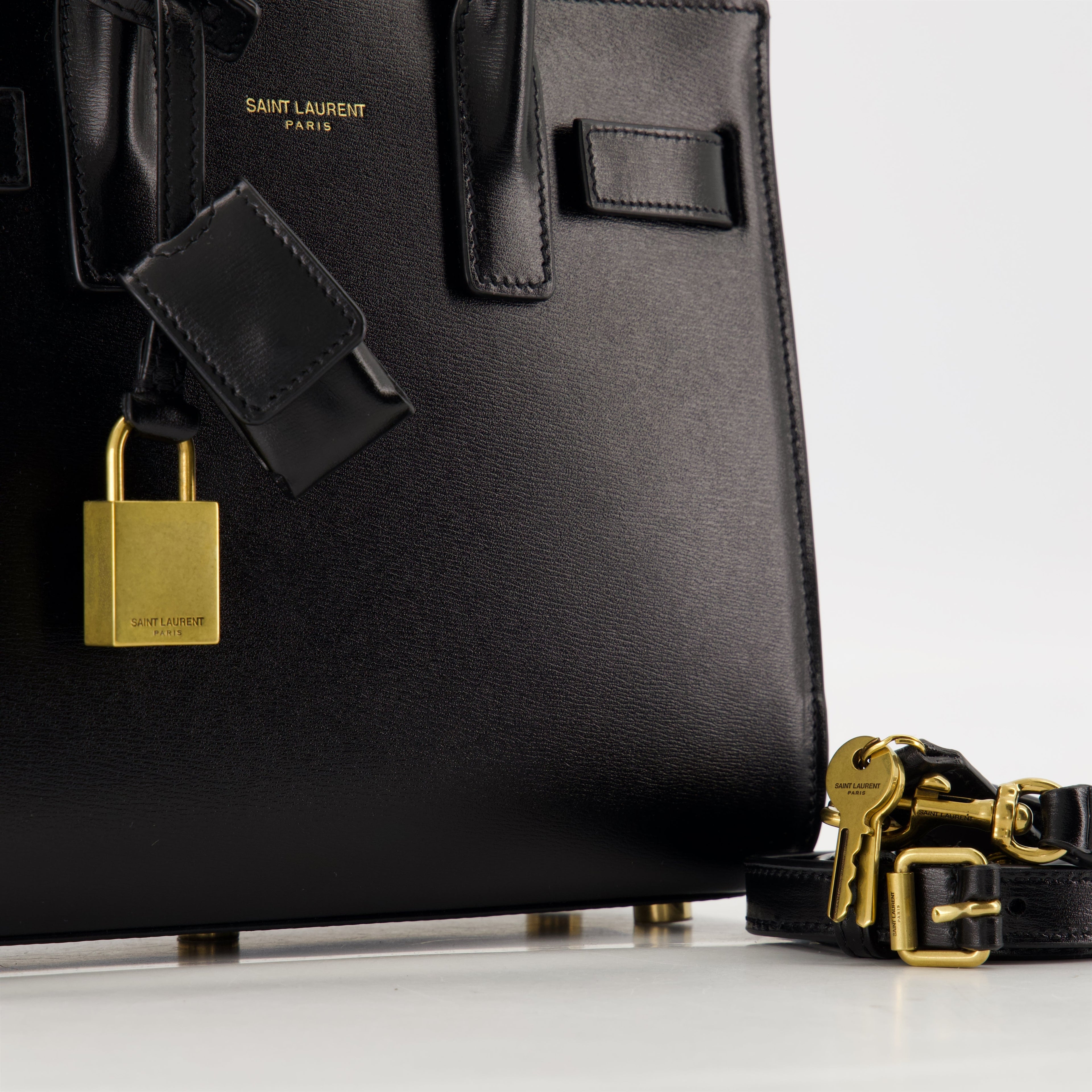 black leather bag, Saint Laurent bag, designer handbags, autumn winter collection, adjustable shoulder bag