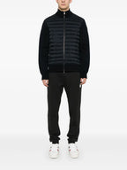 Image of Bi-material down jacket by Moncler for Men - Season Spring-Summer 2025 - Model view 1