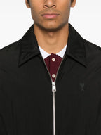 Image de la veste noire zippée classique par Ami PARIS pour homme - Saison Printemps-Été 2025 - Détail vue 7