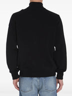 black down jacket, bi-material jacket, Moncler jacket, stylish outerwear, men’s winter coat