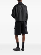 Image d'une veste en nylon noir de Prada pour hommes - Saison Printemps-Été 2025 - Détail vue 1