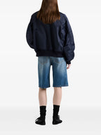 Imagen de pantalones bermudas de mezclilla de Prada para mujeres - Temporada Primavera-Verano 2025 - Vista de detalle 1