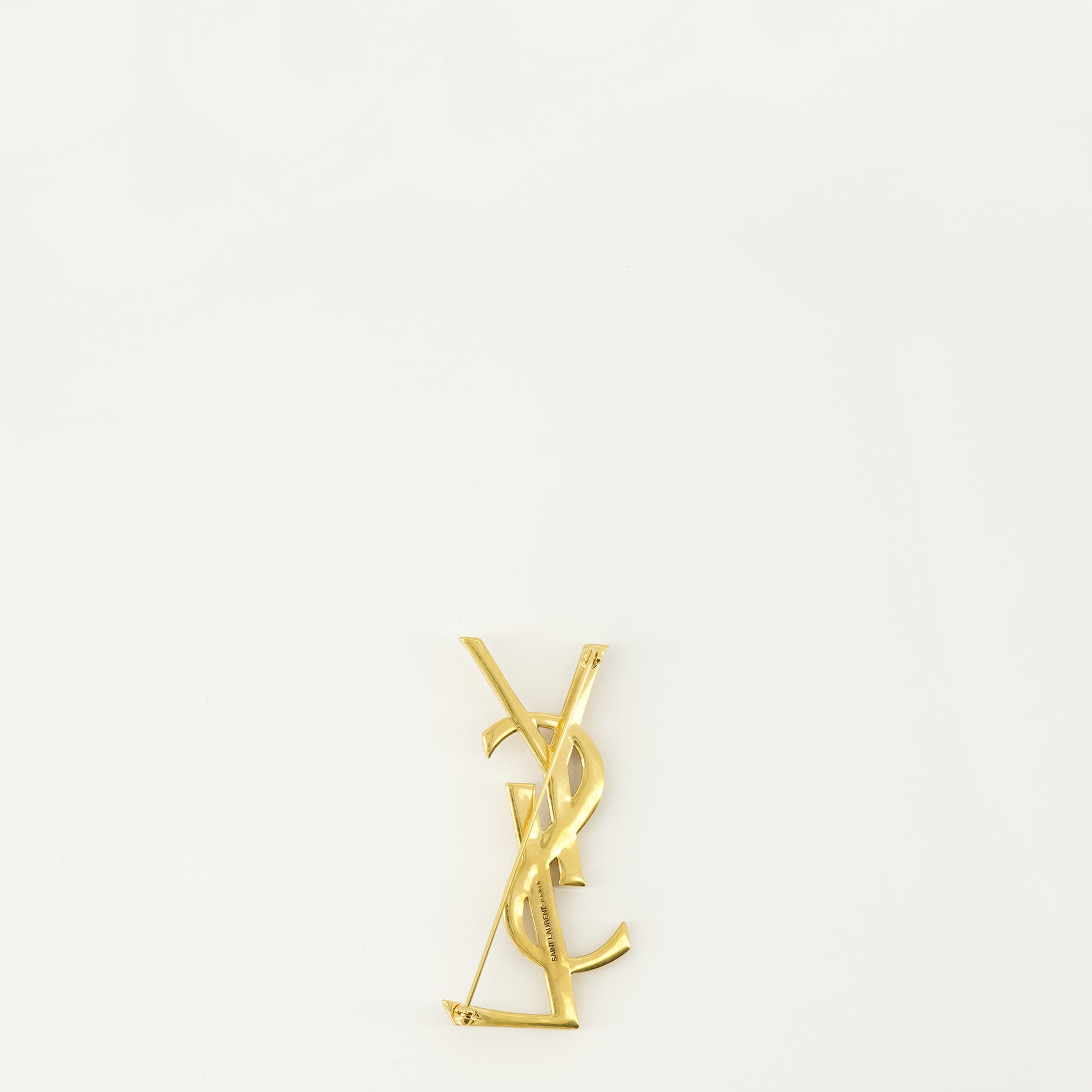 Saint Laurent brooch, Cassandre serpent accessory, metallic gold pin, luxury accessories, high-end jewelry