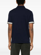 Image of Moncler Navy Logo Polo by Moncler for Men - Season Spring-Summer 2025 - Detail View 1