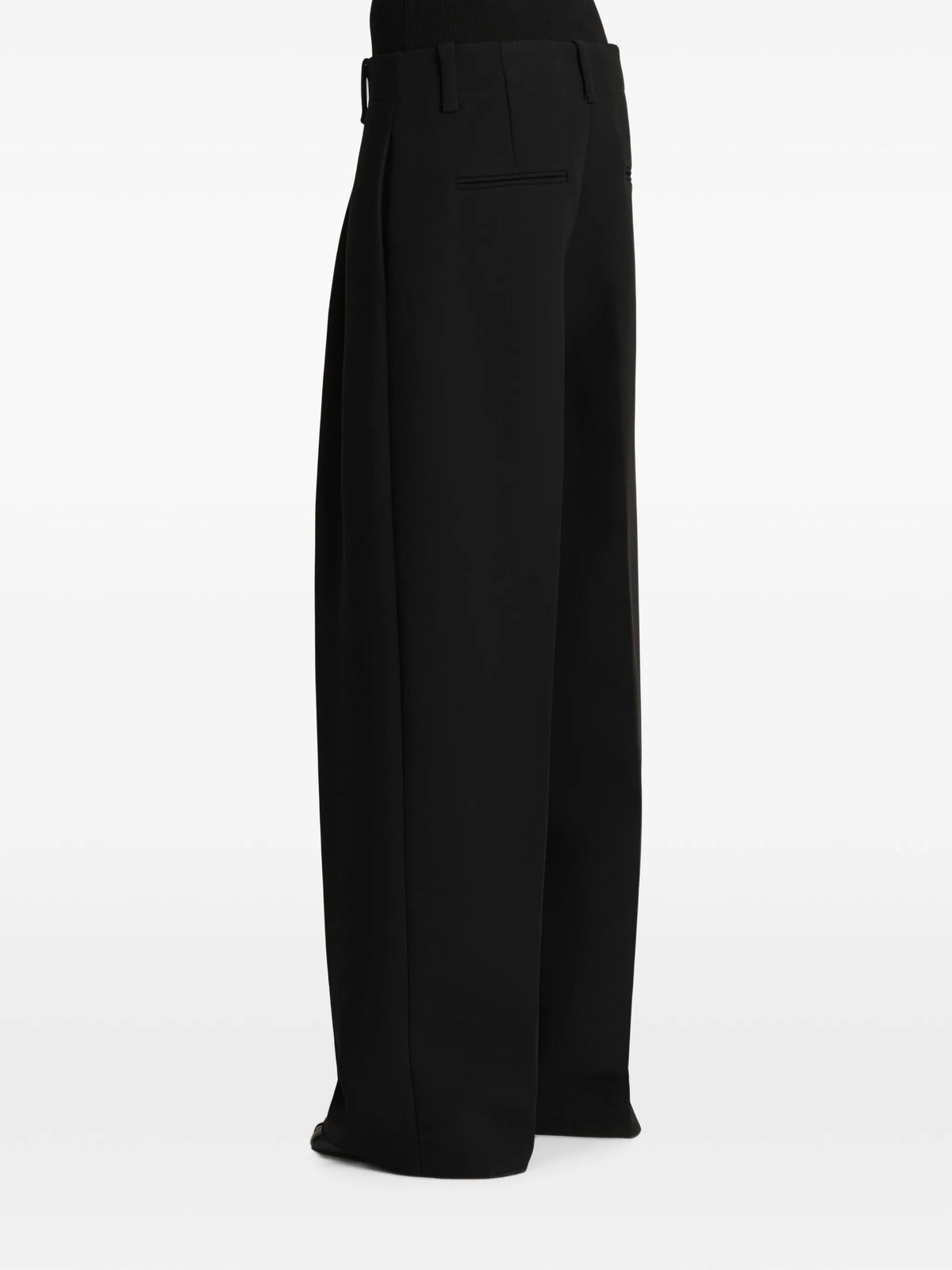 Image of Black Lenton Trousers by Khaite for Women - Season Spring-Summer 2025 - Model View 3