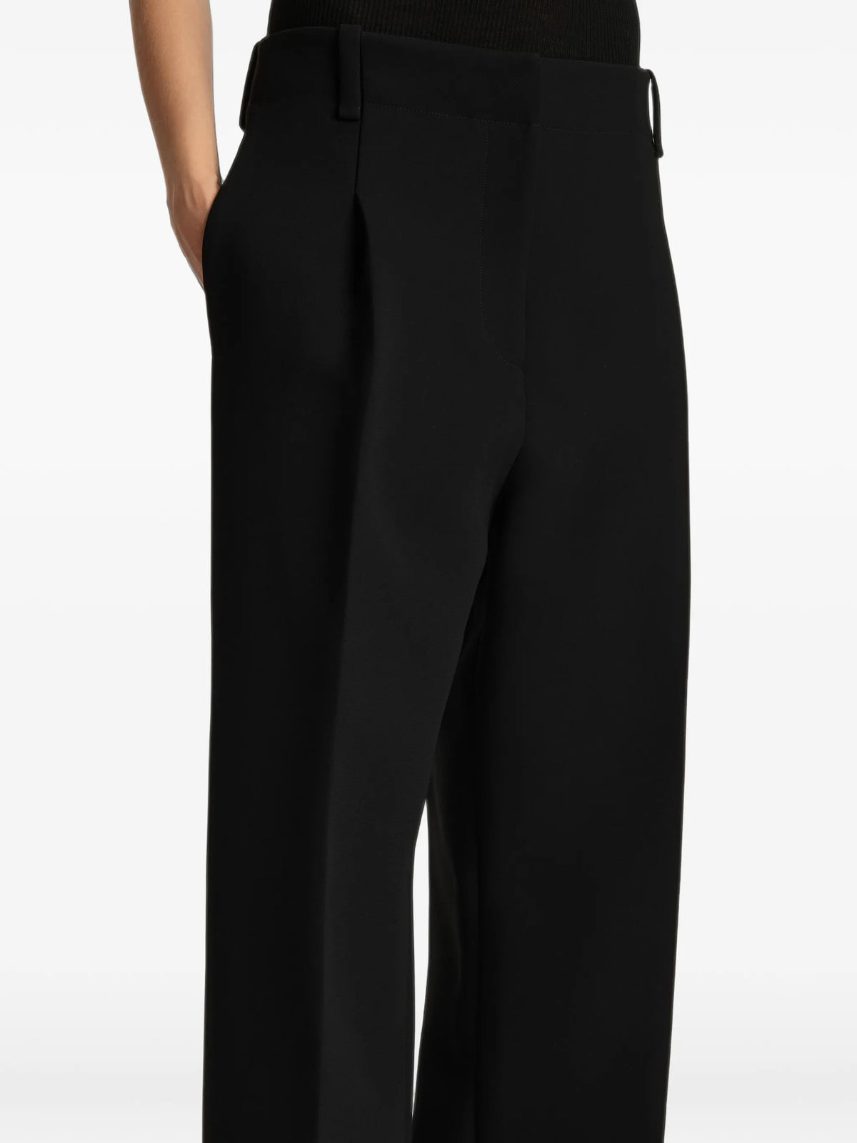 Image of Black Lenton Trousers by Khaite for Women - Season Spring-Summer 2025 - Model View 4