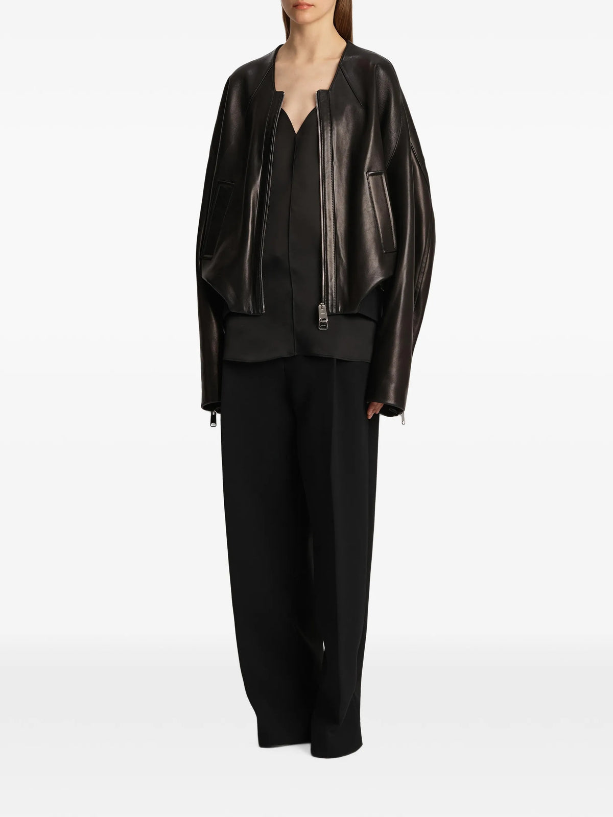 Image of Black Lenton Trousers by Khaite for Women - Season Spring-Summer 2025 - Model View 1