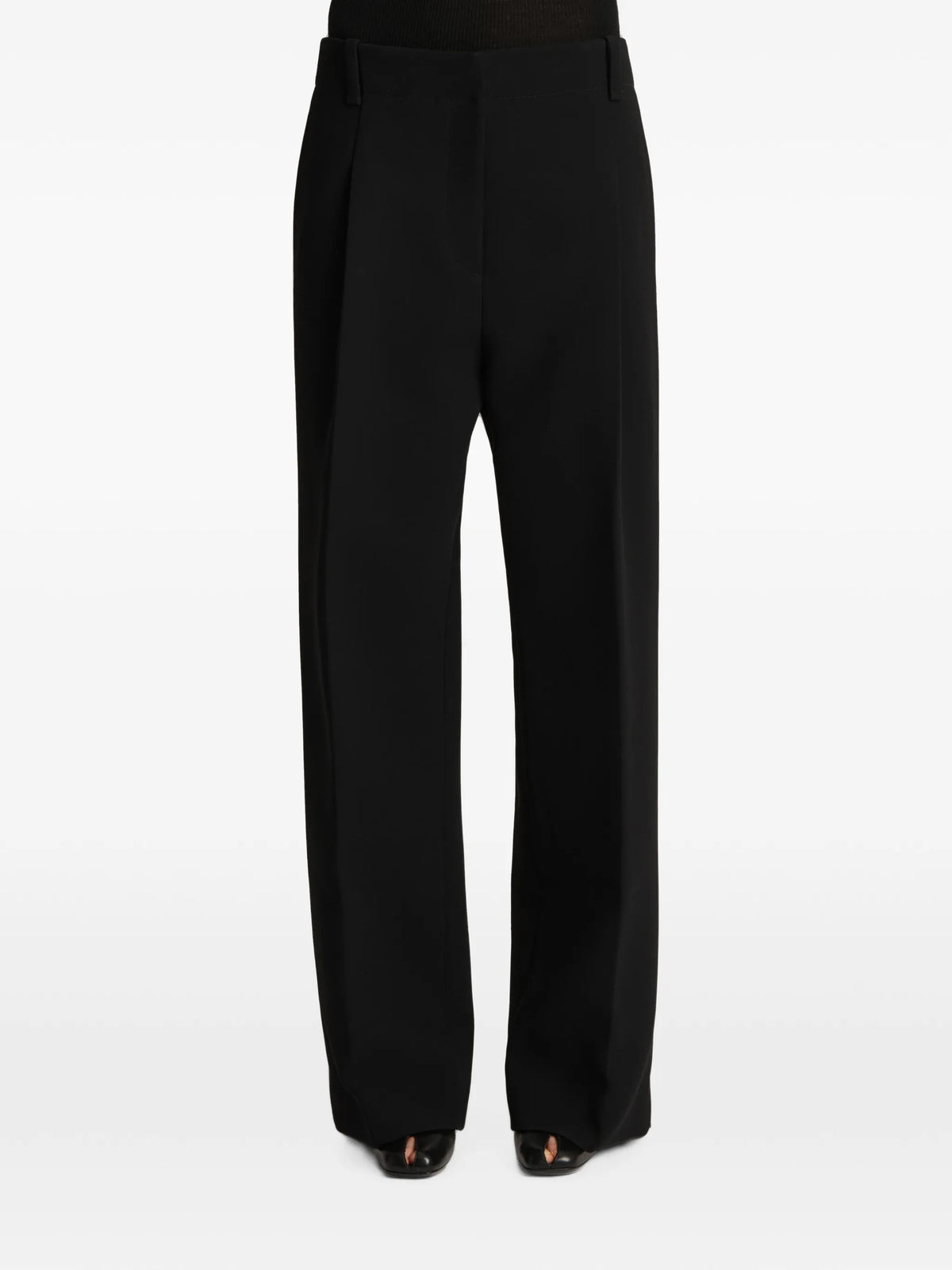 Image of Black Lenton Trousers by Khaite for Women - Season Spring-Summer 2025 - Model View 2