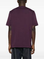 Image of Bordeaux Leather Logo T-Shirt by Moncler for Men - Season Autumn-Winter 2025 - Model view 2