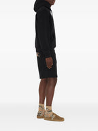 Image of Knight Black Hoodie by Burberry for Men - Season Autumn-Winter 2025 - Model view 2