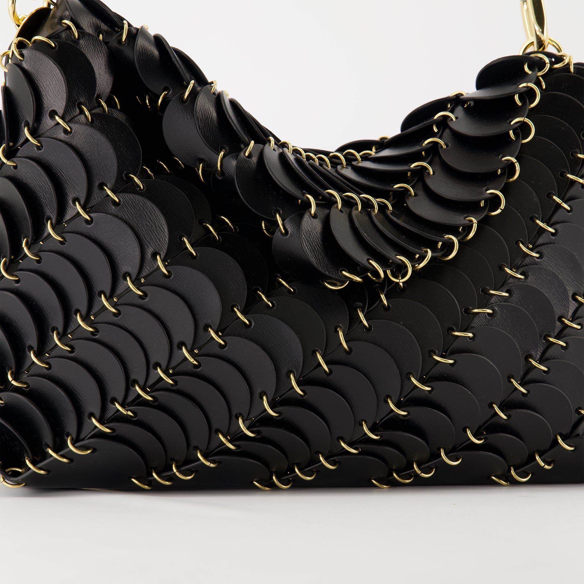 black leather bag, Paco bag, designer accessory, modern handbag, elegant purse