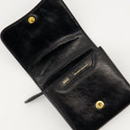 black leather wallet, AMI Paris, grained leather, practical wallet, stylish accessory