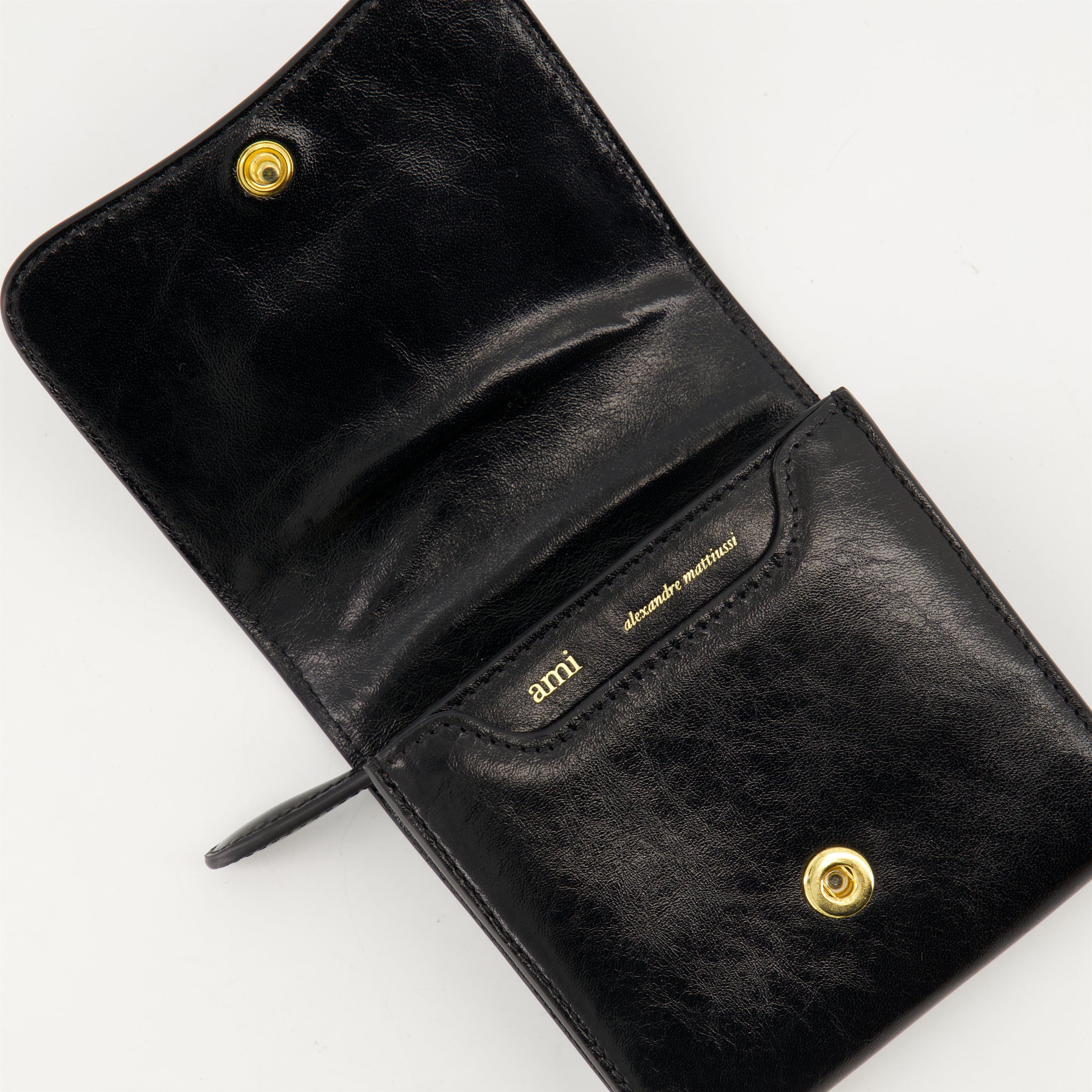 black leather wallet, AMI Paris, grained leather, practical wallet, stylish accessory