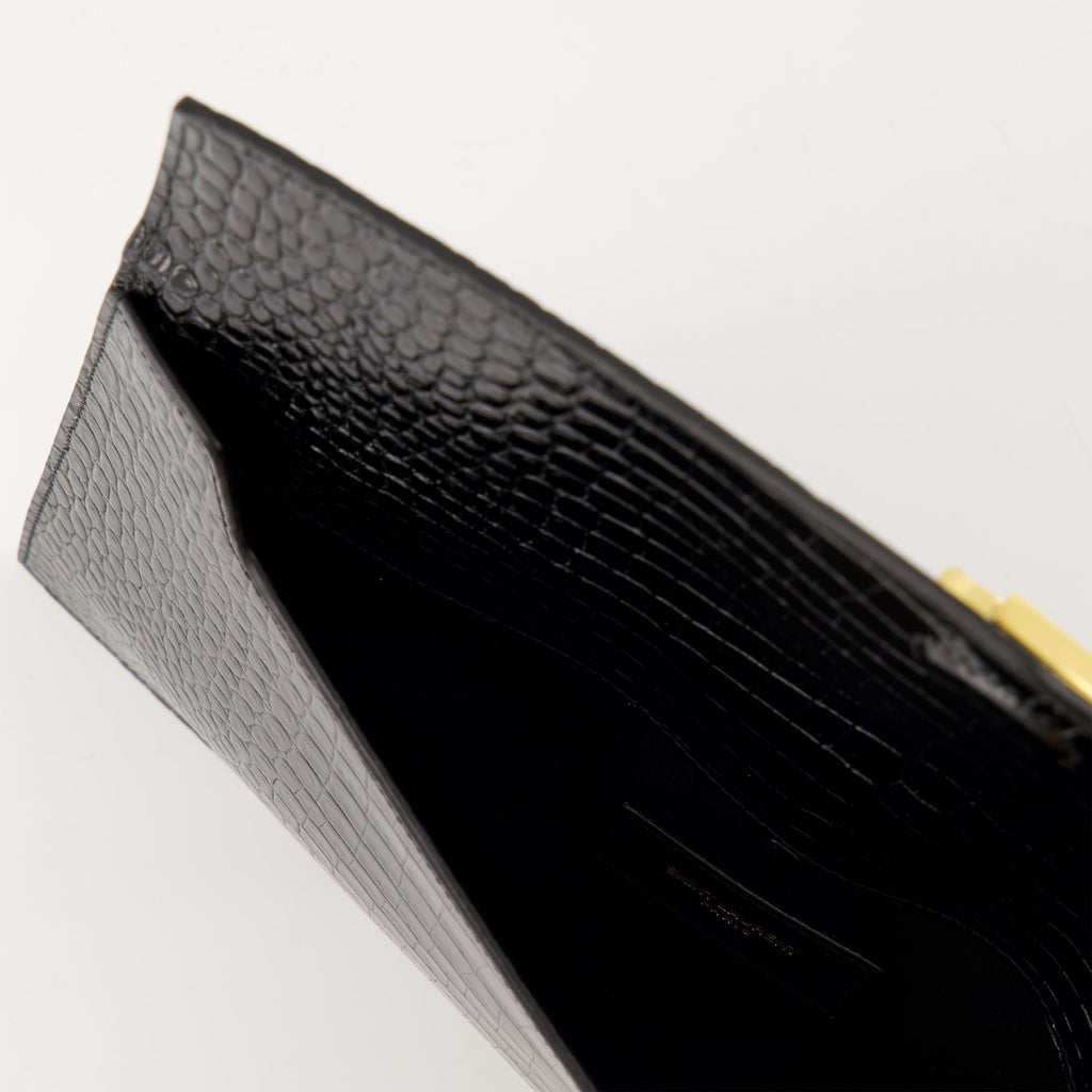Uptown pouch, crocodile-effect accessory, Saint Laurent pouch, black leather pouch, Autumn-Winter 2025 collection
