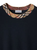 Immagine del maglione in lana a quadri di Burberry per uomo - Stagione Autunno-Inverno 2025 - Vista modello 3