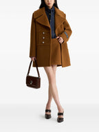 Image of Brown Wool Coat by Patou for Women - Season Autumn-Winter 2025 - Model view 1