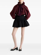 Image of Iconic Bordeaux Blouse by Patou for Women - Season Autumn-Winter 2025 - Model view 1