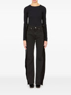 Image of Black Denim Straight Jeans by Mm6 for Women - Season Autumn-Winter 2025 - Model view 1