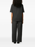 Image of AMI Paris Logo T-Shirt by Ami PARIS for Unisex - Season Autumn-Winter 2025 - Model view 3