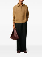 Image of Brown Wool Polo by Ami PARIS for Men - Season Autumn-Winter 2025 - Model view 1