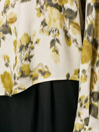 Bild eines floral bedruckten grünen Hemdes von Ami PARIS für Unisex - Saison Herbst-Winter 2025 - Detailansicht 9