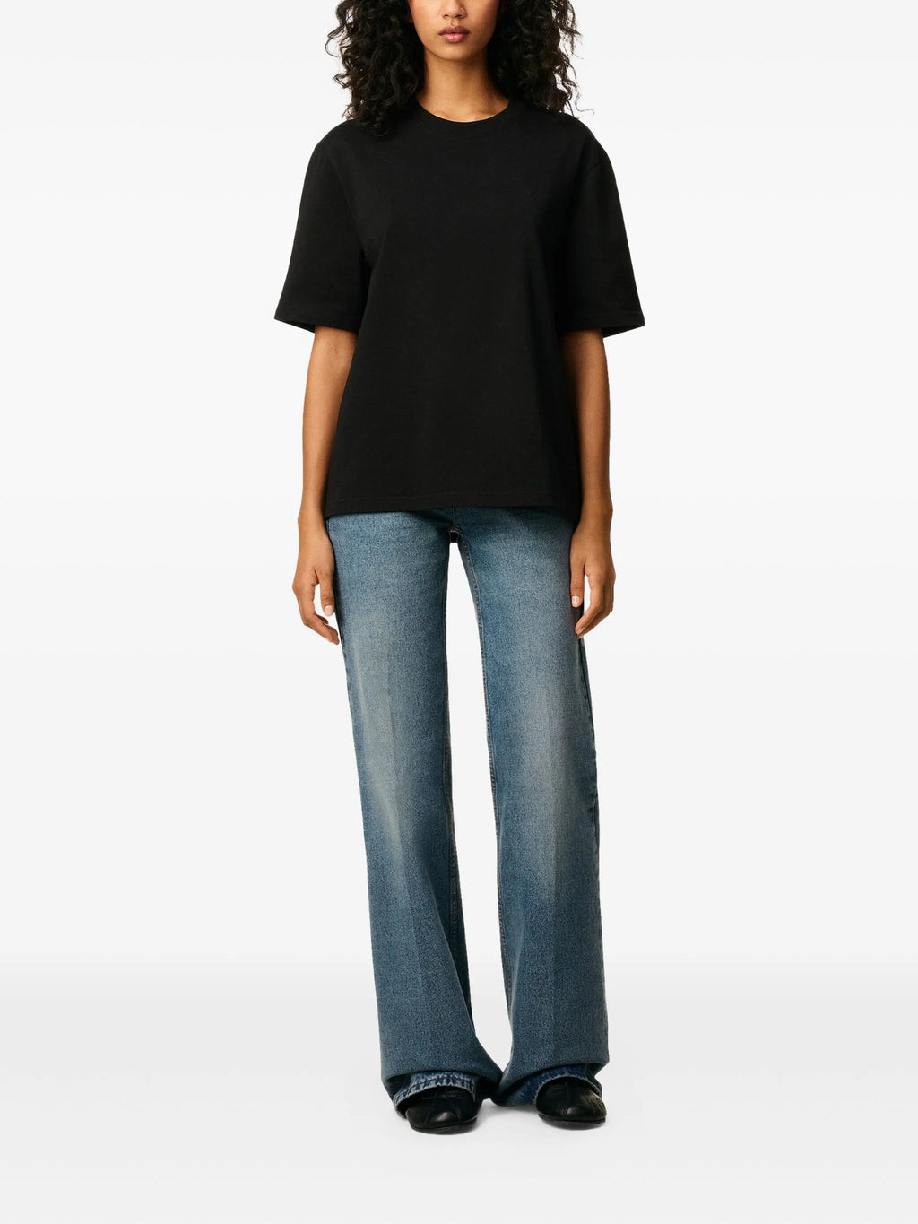 Image of Black Cotton T-Shirt by Ami PARIS for Unisex - Season Spring-Summer 2026 - Model view 2