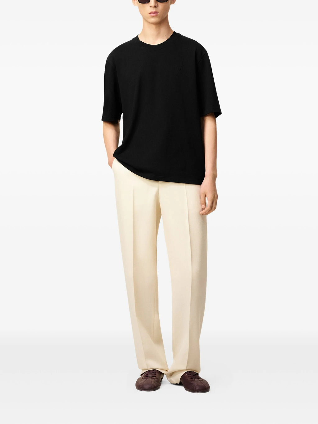 Image of Black Cotton T-Shirt by Ami PARIS for Unisex - Season Spring-Summer 2026 - Model view 1