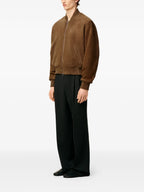 Image of Brown Suede Bomber Jacket by Ami PARIS for Men - Season Autumn-Winter 2025 - Model view 2