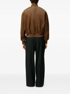 Image of Brown Suede Bomber Jacket by Ami PARIS for Men - Season Autumn-Winter 2025 - Model view 3