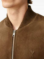 Image of Brown Suede Bomber Jacket by Ami PARIS for Men - Season Autumn-Winter 2025 - Model view 5