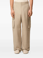Image of Beige Cargo Pants by Ami PARIS for Men - Season Autumn-Winter 2025 - Detail View 7