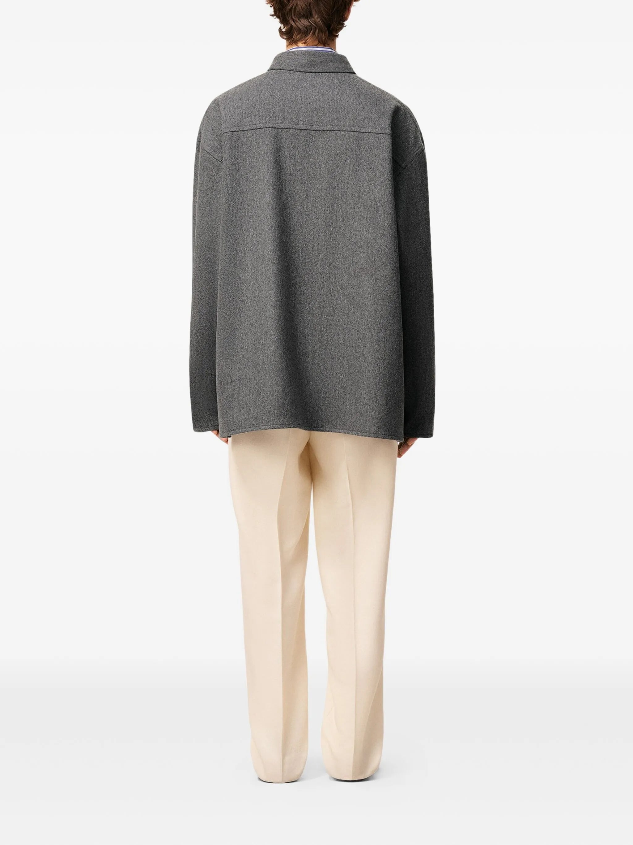 Image of AMI PARIS Polo Shirt by Ami PARIS for Unisex - Season Autumn-Winter 2025 - Model View 1