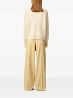 Image of Ami de coeur Roll Neck Sweater by Ami PARIS for Women - Season Fall - Winter 2025 - Model view 3