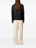 Image of La Veste Trucker by Ami PARIS for Unisex - Season Autumn-Winter 2025 - Model view 2