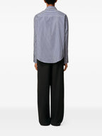 Image of Striped Shirt by Ami PARIS for Unisex - Season Autumn-Winter 2025 - Model view 1