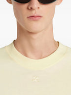 Image of Oversize Yellow T-Shirt by Courrèges for Men - Season Autumn-Winter 2025 - Model view 3