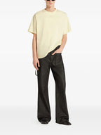 Image of Oversize Yellow T-Shirt by Courrèges for Men - Season Autumn-Winter 2025 - Model view 1