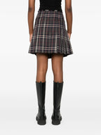 Image of Check Wool Kilt by Burberry for Women - Season Autumn-Winter 2025 - Model view 3