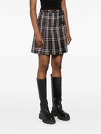 Image of Check Wool Kilt by Burberry for Women - Season Autumn-Winter 2025 - Model view 2