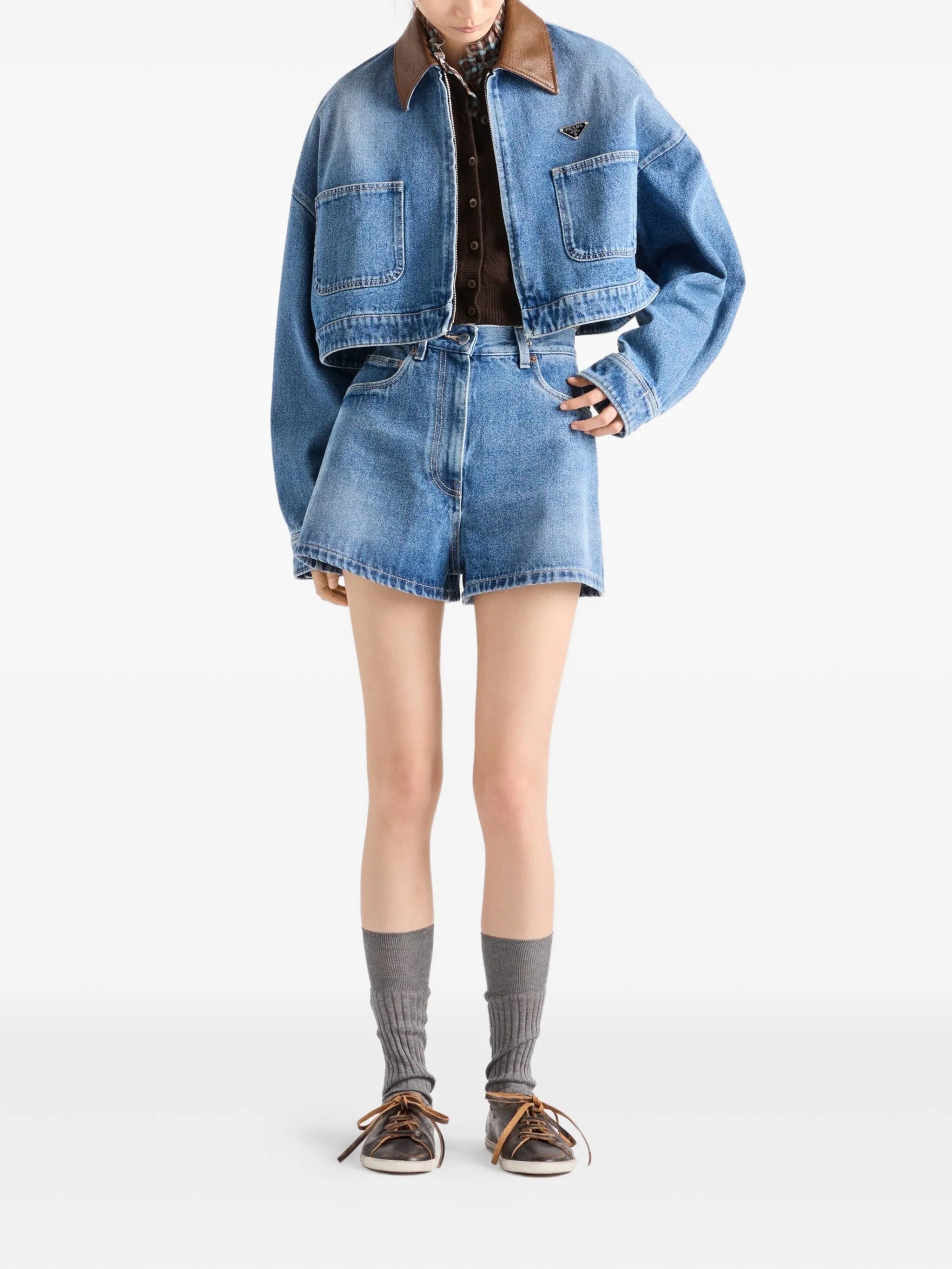 Image of Prada Denim Shorts by Prada for Women - Season Autumn-Winter 2025 - Model view 1
