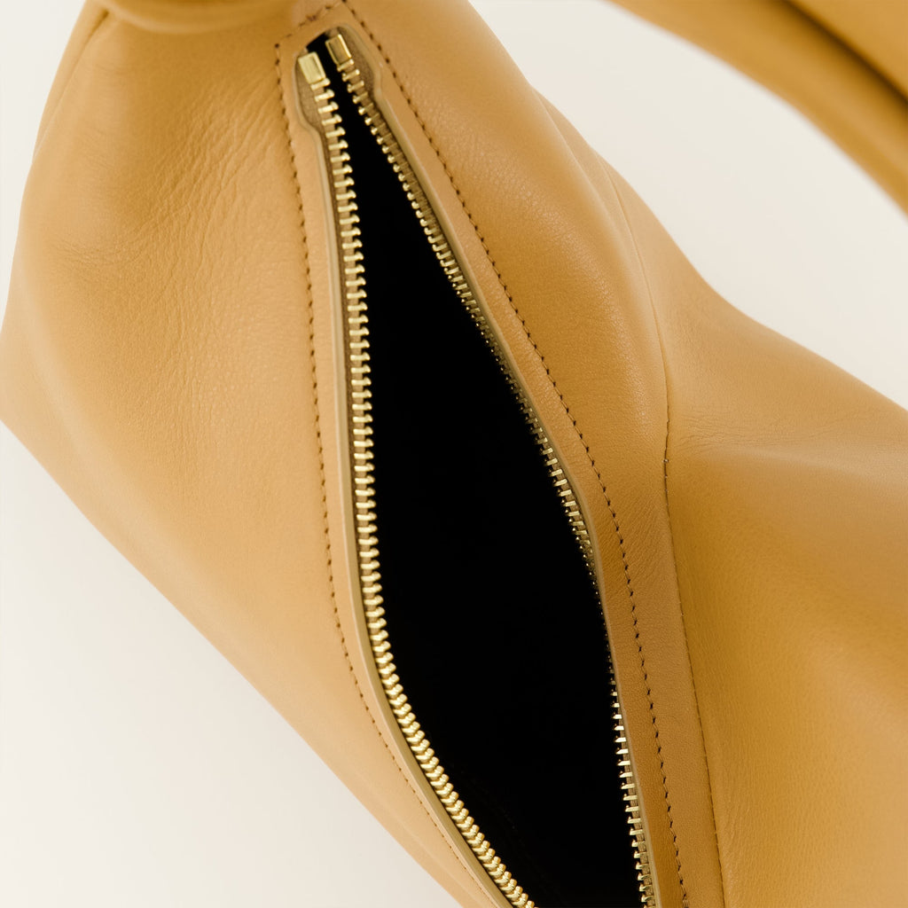 Image of Brown Leather Patou Bag by Patou for Women - Season Spring-Summer 2026 - Detail View 2