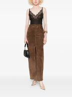 Image of Silk Black Tank Top by Saint Laurent for Women - Season Autumn-Winter 2025 - Model view 1